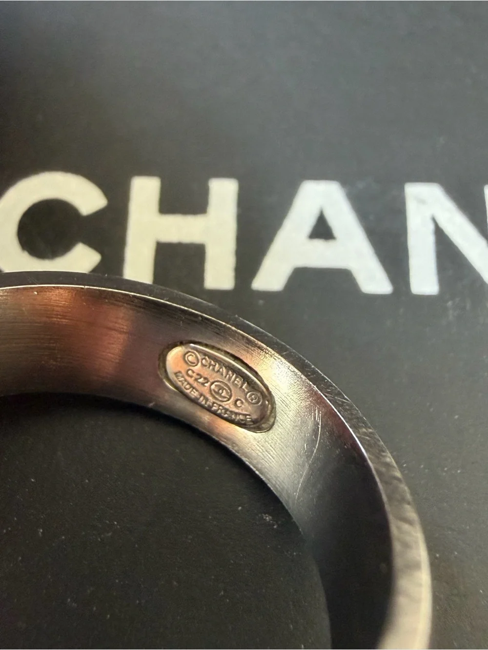 CHANEL ring showcasing